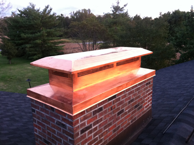 Before and after chimney cap replacement in Floral Park, NY