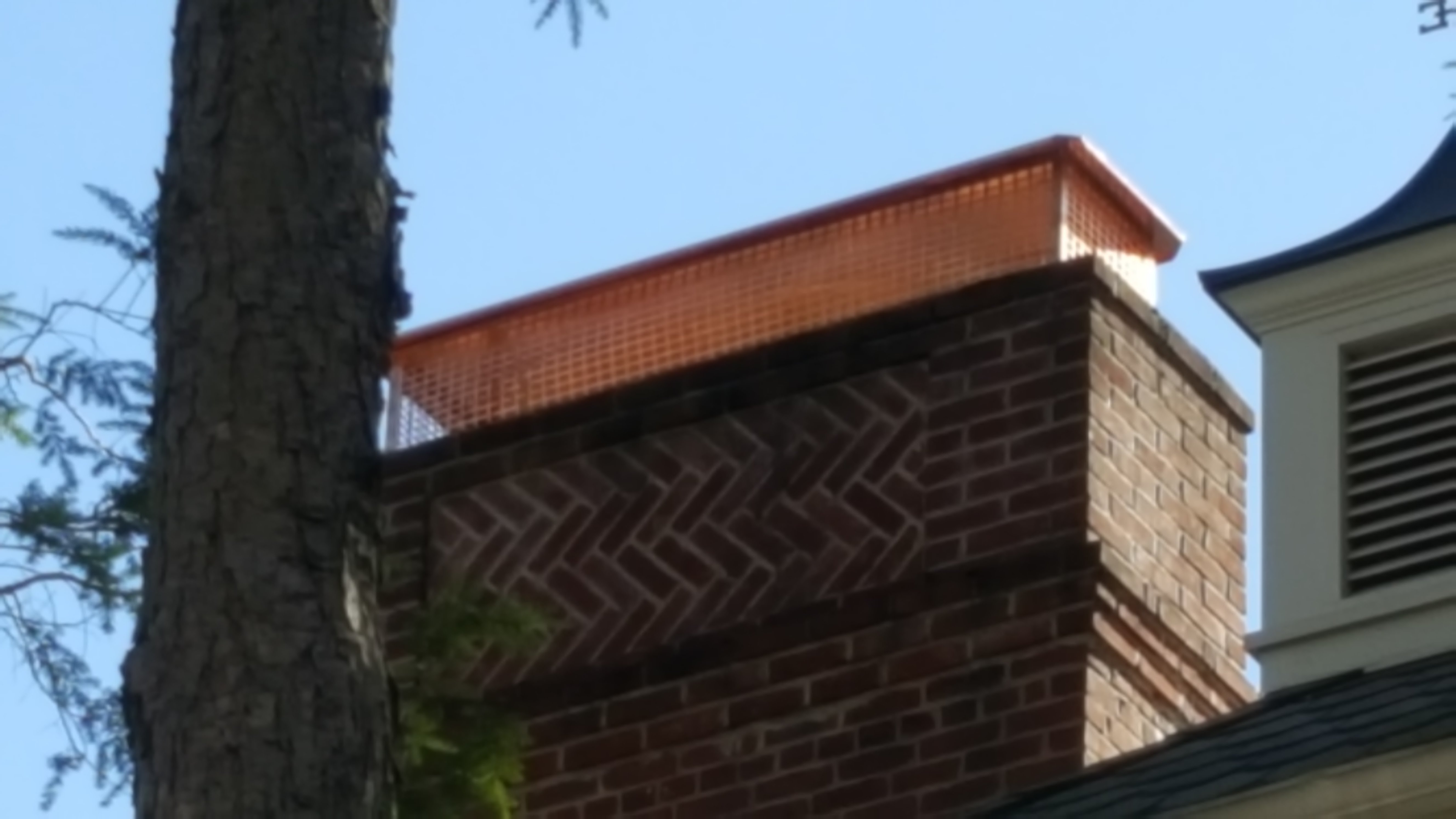 New stainless steel chimney cap installed in Floral Park, NY