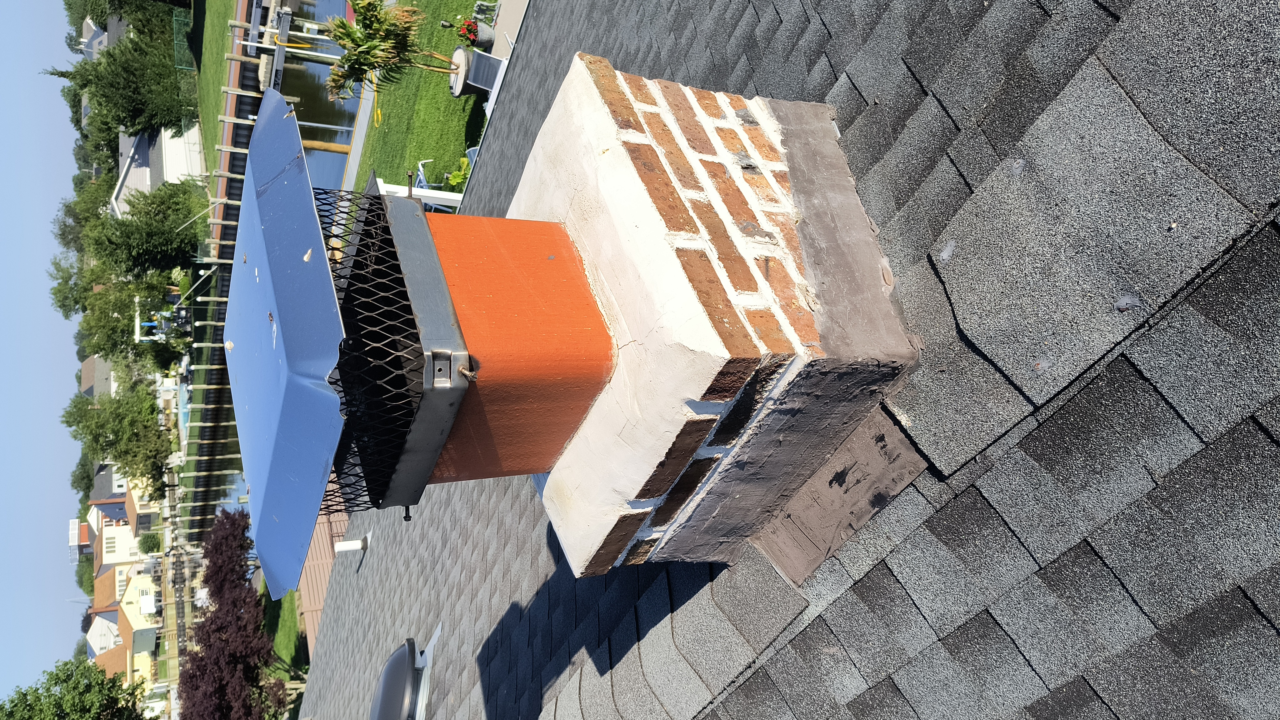 Full chimney masonry rebuild and restoration in Floral Park, NY