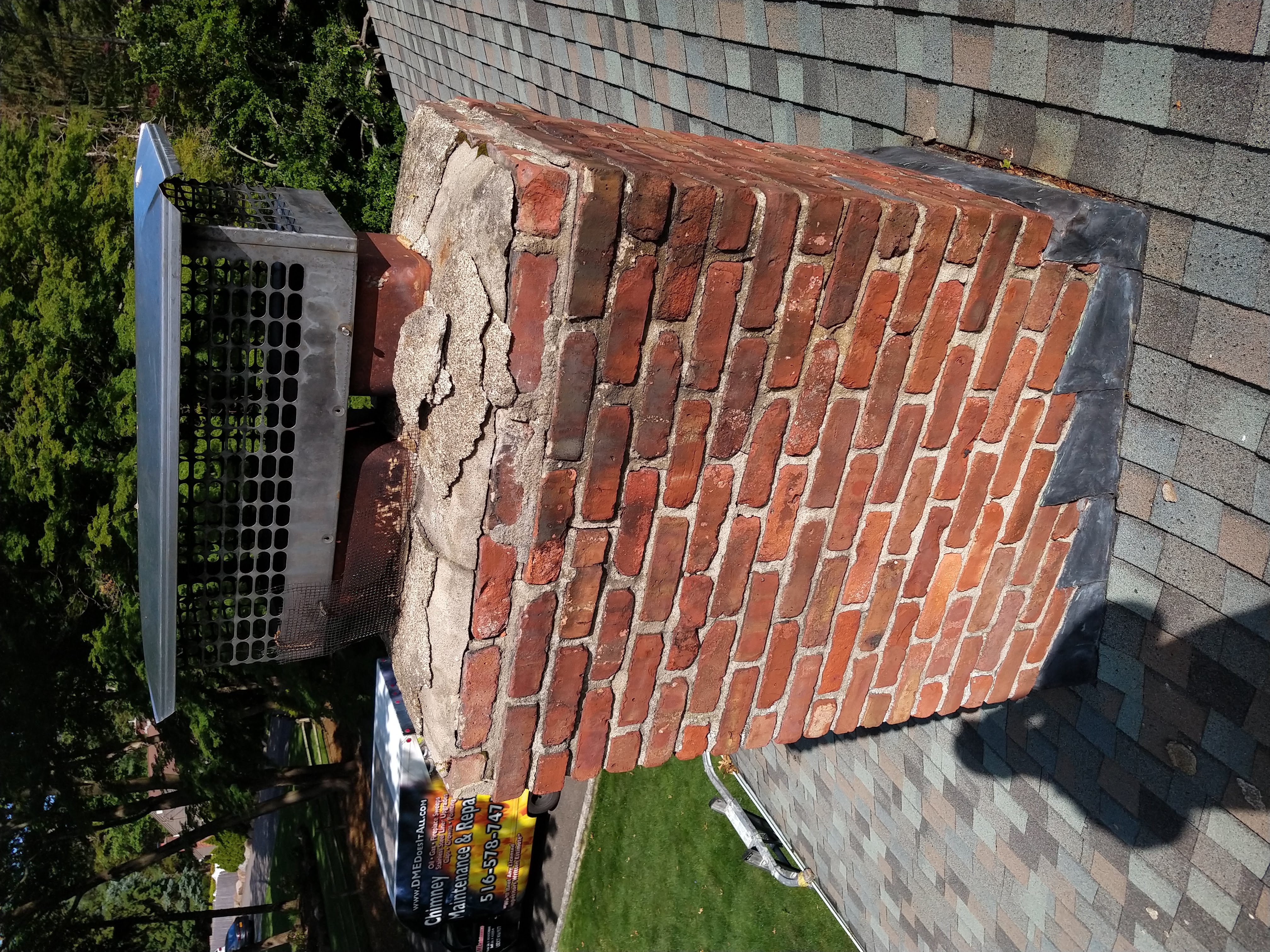 Cracked chimney crown professionally repaired in Floral Park, New York
